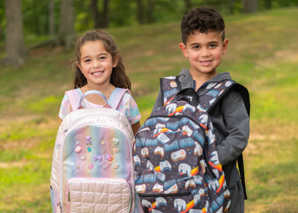 boy and girl with Denny's X Lester's backpacks