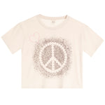 A cream-colored short-sleeve crop top t-shirt featuring a distressed peace sign graphic in the center with a small pink heart outline on the upper left chest.