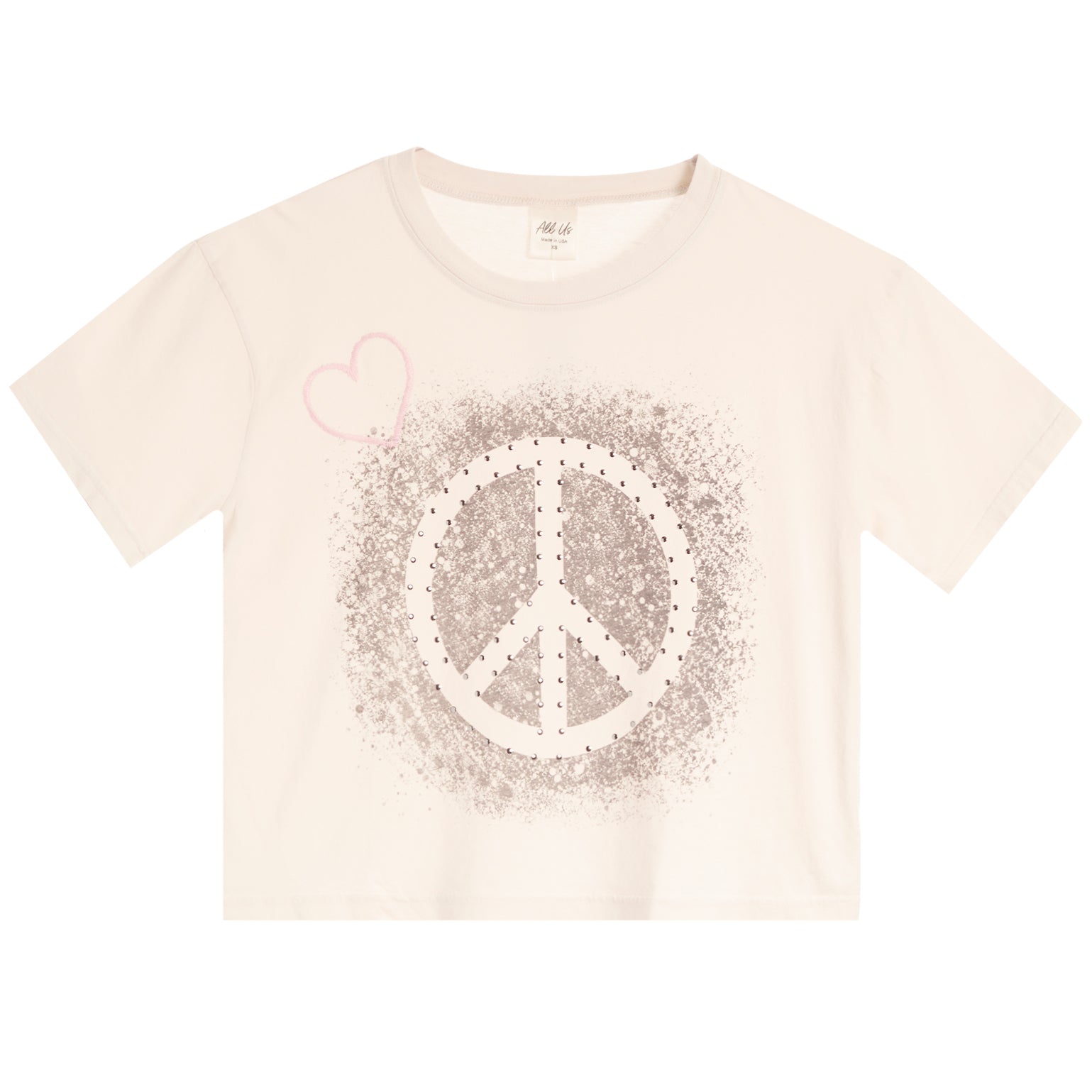 A cream-colored short-sleeve crop top t-shirt featuring a distressed peace sign graphic in the center with a small pink heart outline on the upper left chest.