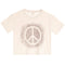 A cream-colored short-sleeve crop top t-shirt featuring a distressed peace sign graphic in the center with a small pink heart outline on the upper left chest.
