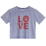 A light blue acid-wash short-sleeve crop top featuring a distressed red graphic print of the word 'LOVE' on the front, displayed flat against a white background.