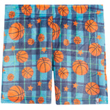 A pair of kids' shorts featuring an orange basketball and star pattern over a blue and teal plaid background, shown flat against a white background.