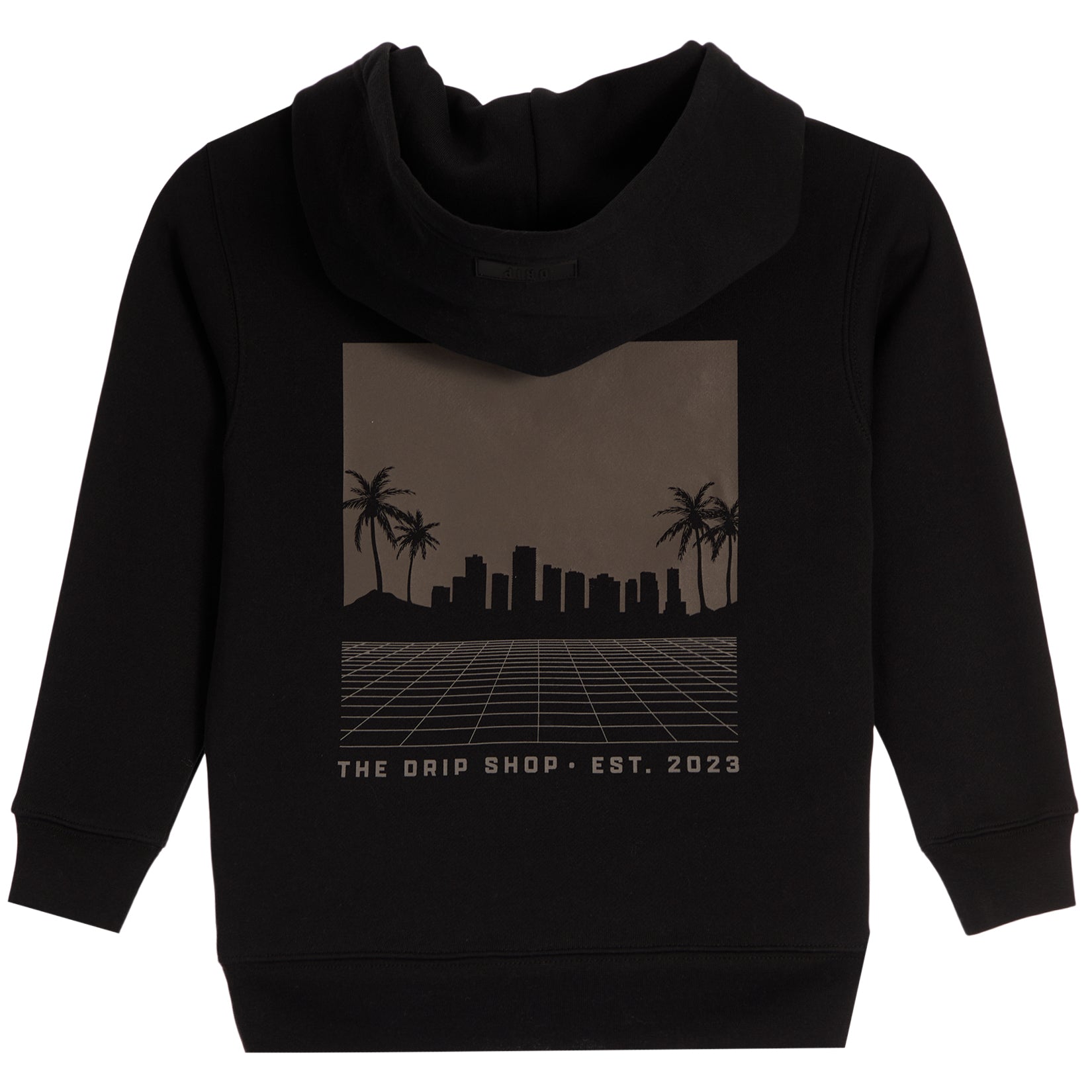 A black pullover hoodie with a rectangular graphic print on the chest. The graphic features a dark brown gradient background with a black silhouette of a city skyline, palm trees, and a grid pattern, with the text 'THE DRIP SHOP • EST. 2023