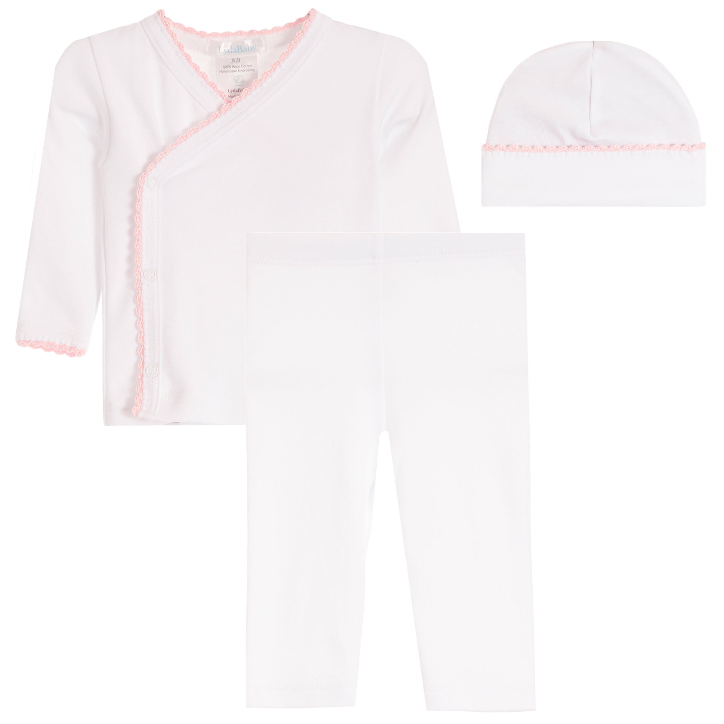 A three-piece baby clothing set including a white long-sleeve wrap top with light pink trim, white leggings, and a white beanie with a pink scalloped edge, displayed on a solid white background.