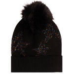 A black knit beanie hat featuring a large black faux fur pom-pom on top and iridescent star pattern knitted all over the front, shown against a plain white background.