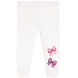 White jogger-style pants with two bow graphics on the lower right leg, one in pink and one in purple, shown on a plain white background.