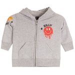 A light heather gray zip-up hoodie for toddlers, featuring a red dripping smiley face graphic with the word 'SILLY' and a black star on the left chest, and a small orange graphic with a black star on the right sleeve.