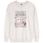 A light heather gray crewneck sweatshirt featuring a central graphic illustration of a pink 'Pastry & Coffee' storefront with a black-and-white striped awning.