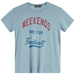 A light blue short-sleeve crewneck t-shirt with a distressed graphic print reading 'WEEKENDS ARE FOR Football' in red and blue lettering.
