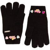 A pair of black knit gloves with colorful decorative patches and charms on the cuffs, shown against a plain white background.