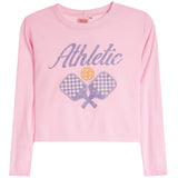 A light pink long-sleeve featuring a graphic print of crossed tennis rackets, a tennis ball, and the word 'Athletic' in purple script across the chest.