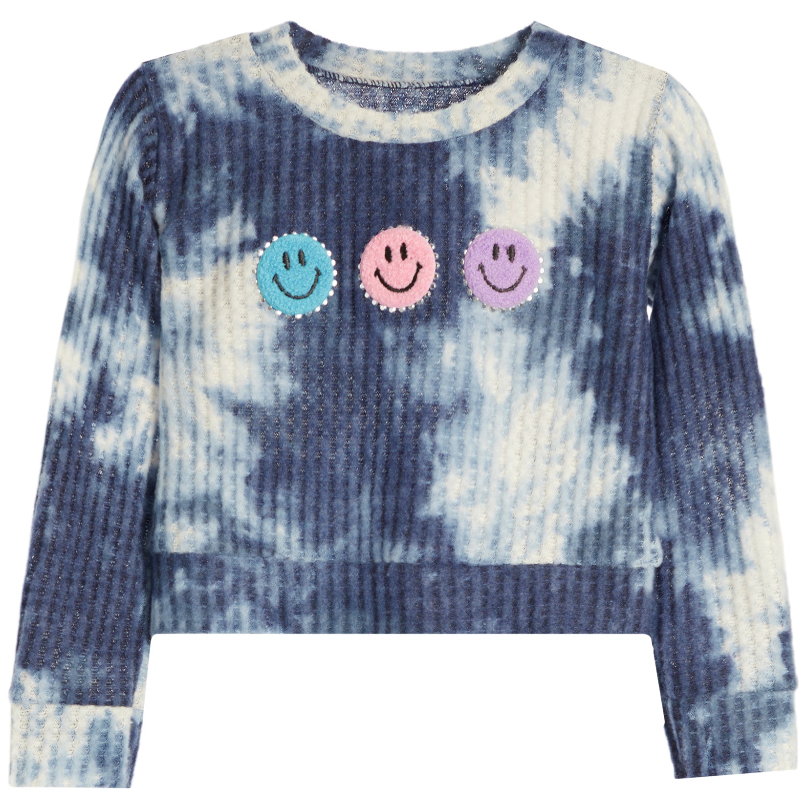 A long-sleeve ribbed knit featuring a blue and white tie-dye pattern, with three colorful smiley face patches across the chest in light blue, pink, and purple.
