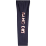 Navy blue sweatpants featuring the words 'GAME DAY' printed vertically in white varsity-style letters with a small star between each word, set against a plain white background.