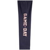 Navy blue sweatpants featuring the words 'GAME DAY' printed vertically in white varsity-style letters with a small star between each word, set against a plain white background.