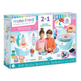 Make It Real Mini Pottery and Spin Art Studio 2-in-1 toy set in its retail packaging, featuring a pastel blue and white spinning wheel and clay tools, with illustrations of children playing on the box front.