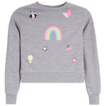 A heather gray crewneck sweatshirt featuring colorful cartoon graphics including a rainbow, butterfly, panda, cherries, ice cream cone, star, and hearts.