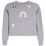 A heather gray crewneck sweatshirt featuring colorful cartoon graphics including a rainbow, butterfly, panda, cherries, ice cream cone, star, and hearts.
