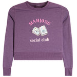 A heather purple cropped crewneck sweatshirt featuring a pink and white graphic print on the front with the text 'MAHJONG social club' and an illustration of mahjong tiles.