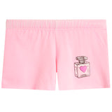 Light pink shorts featuring a small graphic of a perfume bottle with a pink heart on the lower left leg, set against a plain white background.