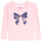 A light pink long-sleeve t-shirt for kids, featuring a large blue sequined bow graphic on the front.