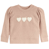 A pink ribbed knit sweater with three cream-colored hearts on the chest, displayed against a solid white background.