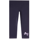 Dark navy blue leggings for toddlers, featuring a small embroidered light purple bow with white polka dots on the lower left leg, shown against a plain white background.