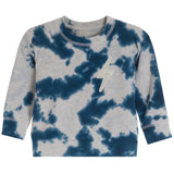 A long-sleeve crewneck sweatshirt featuring a blue and gray tie-dye pattern with a white glittery lightning bolt graphic on the chest, displayed on a solid white background.