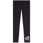 Black leggings with a textured, glittery silver heart design on the lower left leg, displayed flat against a solid white background.