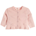 A light pink baby cardigan sweater with textured pom-pom details, buttoned front, and ribbed trim, shown against a plain white background.