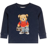 A navy blue long-sleeve waffle-knit shirt for a toddler, featuring a graphic of a teddy bear wearing a red t-shirt, blue jeans, headphones, and holding a boombox.