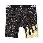 Black boxer briefs with a colorful sprinkle pattern and a yellow ice cream cone graphic on the lower right leg, featuring a black waistband with white branding.