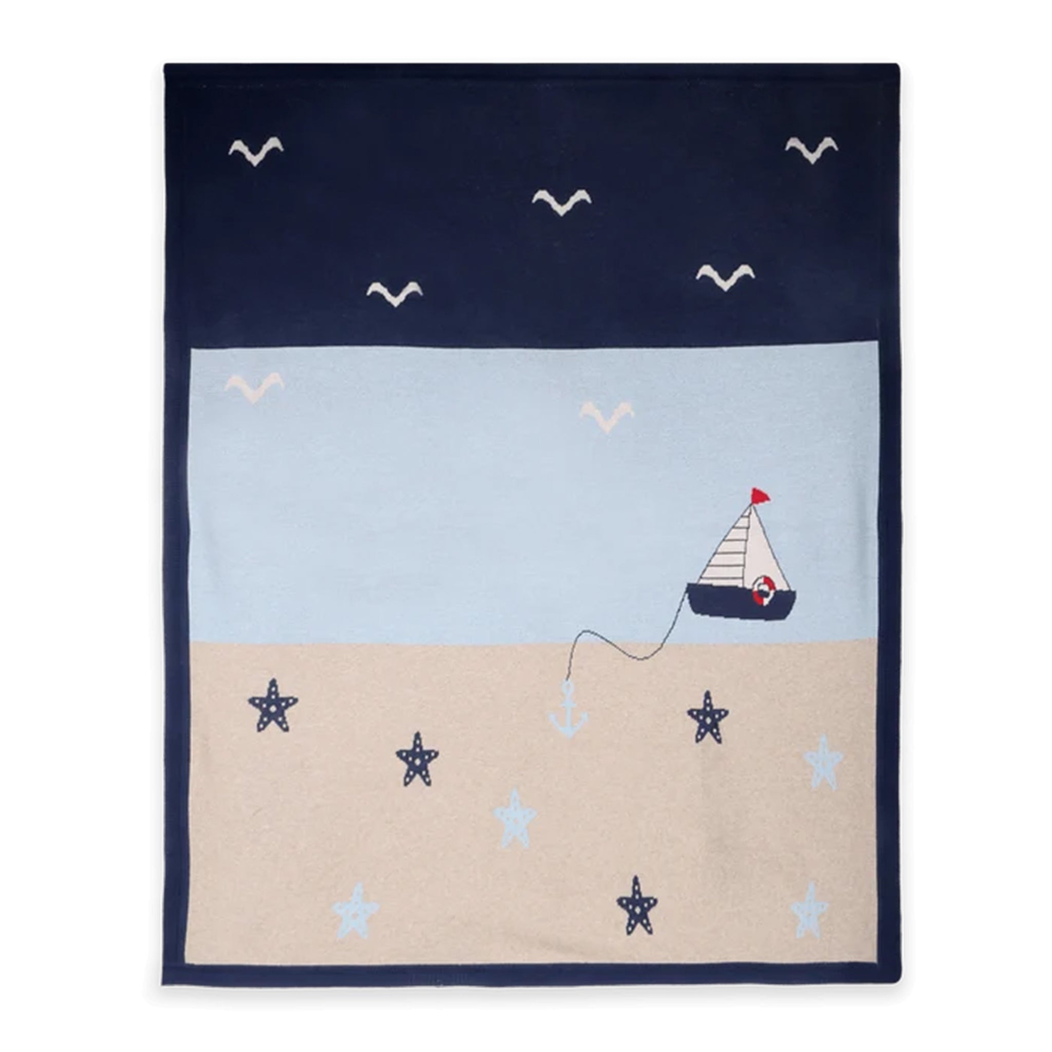 A square navy blue blanket or throw featuring a nautical design with a light blue sky, beige sand, a small sailboat, seagulls, anchors, and starfish.