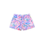 A pair of girls' shorts featuring a pastel tie-dye pattern with a colorful pop-art graphic print of cosmetics, hearts, and the words 'LOVE' and 'FABULOUS!'.