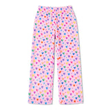 Pink fleece pajama pants with an all-over colorful heart print, featuring an elastic waistband and side pockets, shown flat on a white background.