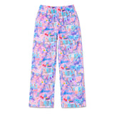 A pair of wide-leg lounge pants featuring a colorful, playful all-over print with cosmetics, makeup tools, and the word 'FABULOUS' in various shades of pink, purple, blue, and yellow on a white background.