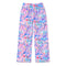 A pair of wide-leg lounge pants featuring a colorful, playful all-over print with cosmetics, makeup tools, and the word 'FABULOUS' in various shades of pink, purple, blue, and yellow on a white background.