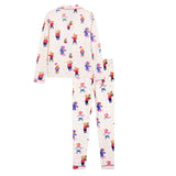 A two-piece long-sleeve pajama set featuring a festive Christmas print of Bears skiing and holding gifts, set against a plain white background.
