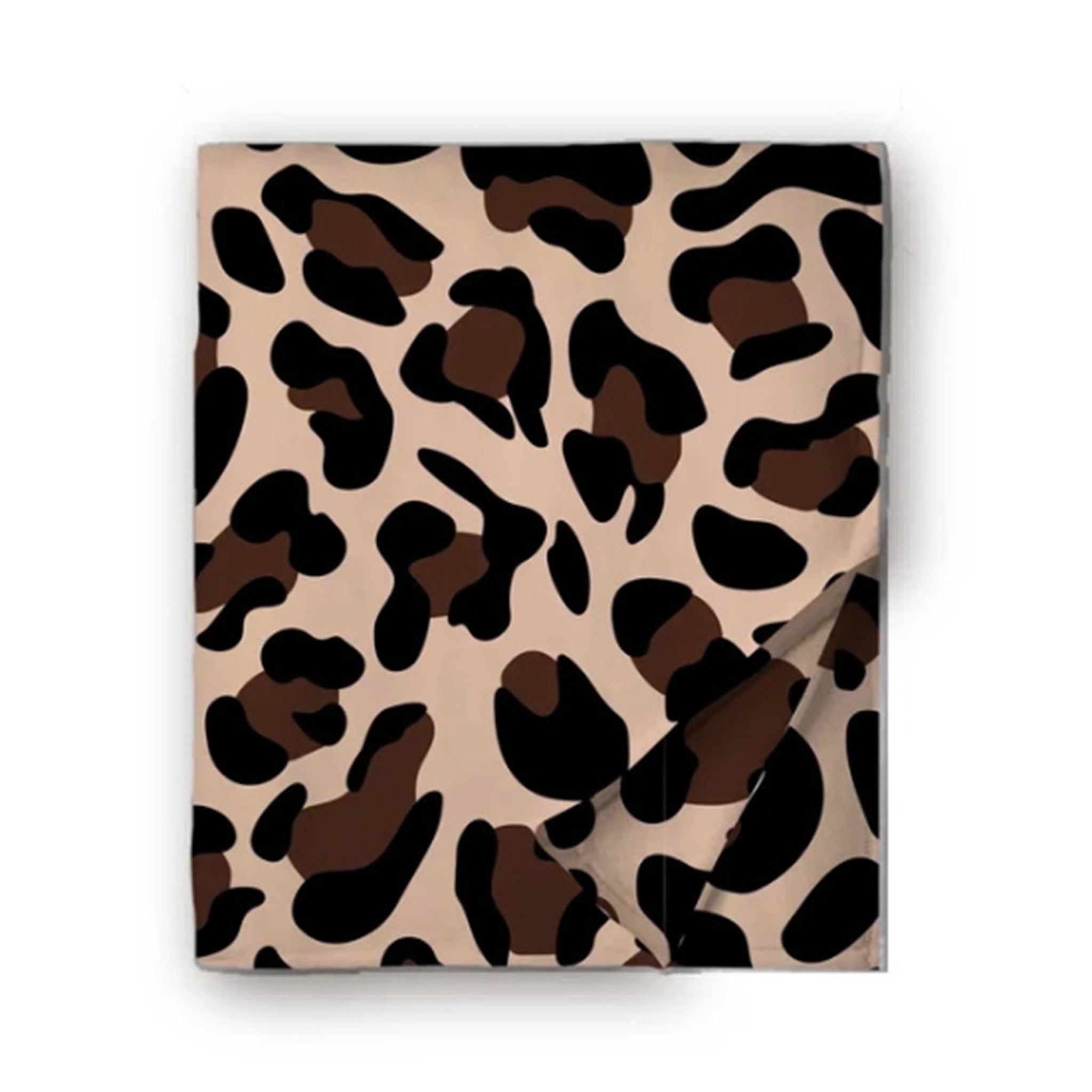 A folded blanket, featuring a classic leopard print pattern in beige, brown, and black, with one corner folded over on a white background.