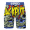 A pair of boxer briefs featuring a vibrant comic-style graphic print with the word 'JACKPOT' in bold yellow letters, surrounded by cartoon explosions and scattered dollar bills. The waistband is blue with a white 'PSD' logo.