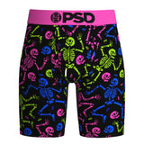 Black boxer briefs featuring a vibrant neon pattern of pink, blue, and green skeletons, with a bright pink waistband displaying the black 'PSD' logo.