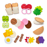 Collection of toy food items on a white background
