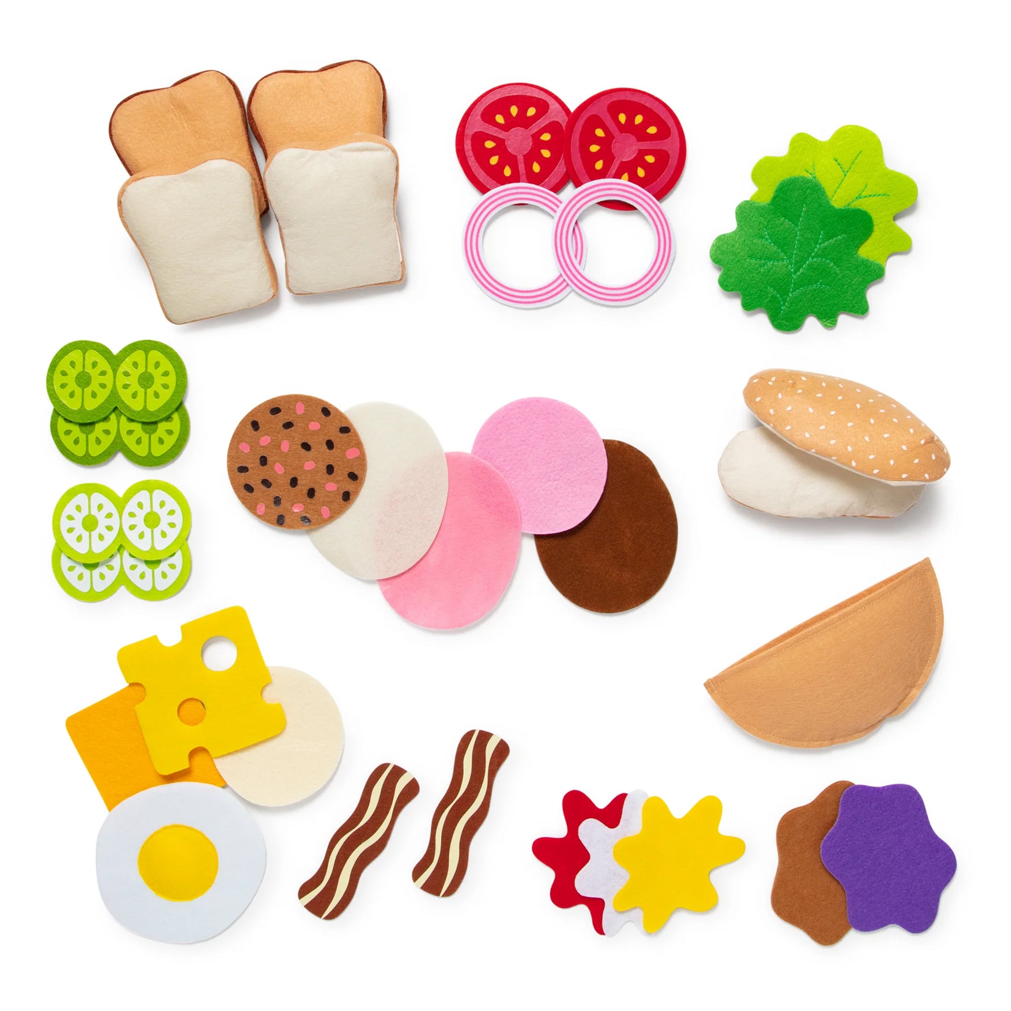 Collection of toy food items on a white background