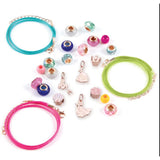 Three braided cord bracelets in turquoise, lime green, and hot pink, arranged on a white background with assorted decorative beads and charms around them.
