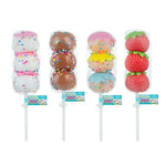 Four packaged novelty lollipops shaped like donuts, ice cream sundaes, and strawberries, displayed side by side on a white background.