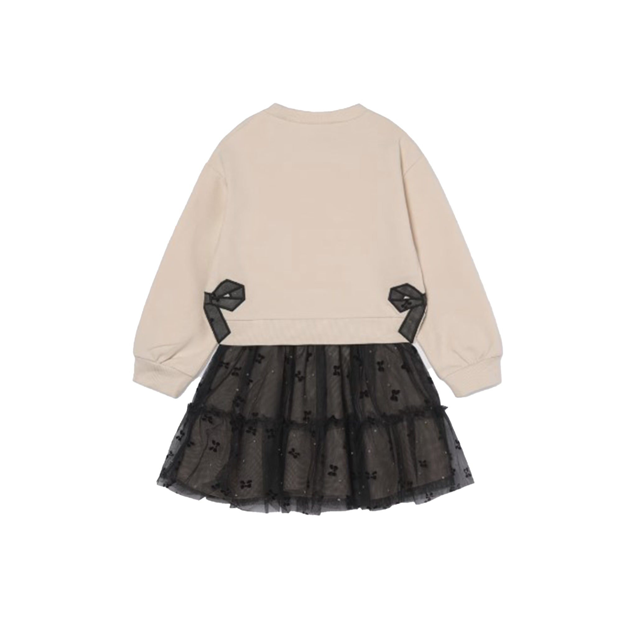 A children's long-sleeve dress shown from the back, featuring a beige sweatshirt-style upper body with black ribbon accents at the waist and a black tulle tutu skirt with small black bow details.