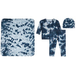 A baby clothing set with a dark blue and light blue tie-dye pattern, including a long-sleeve wrap top, matching pants, a beanie, and a square blanket, displayed on a solid white background.