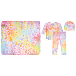 A children's tie-dye clothing set laid out on a white background, including a large square blanket, a short-sleeve wrap-style top, matching pants, and a beanie. The fabric has a pastel rainbow tie-dye pattern with pink, yellow, blue, orange, and purple tones.