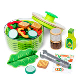 Toy salad set with various components on a white background