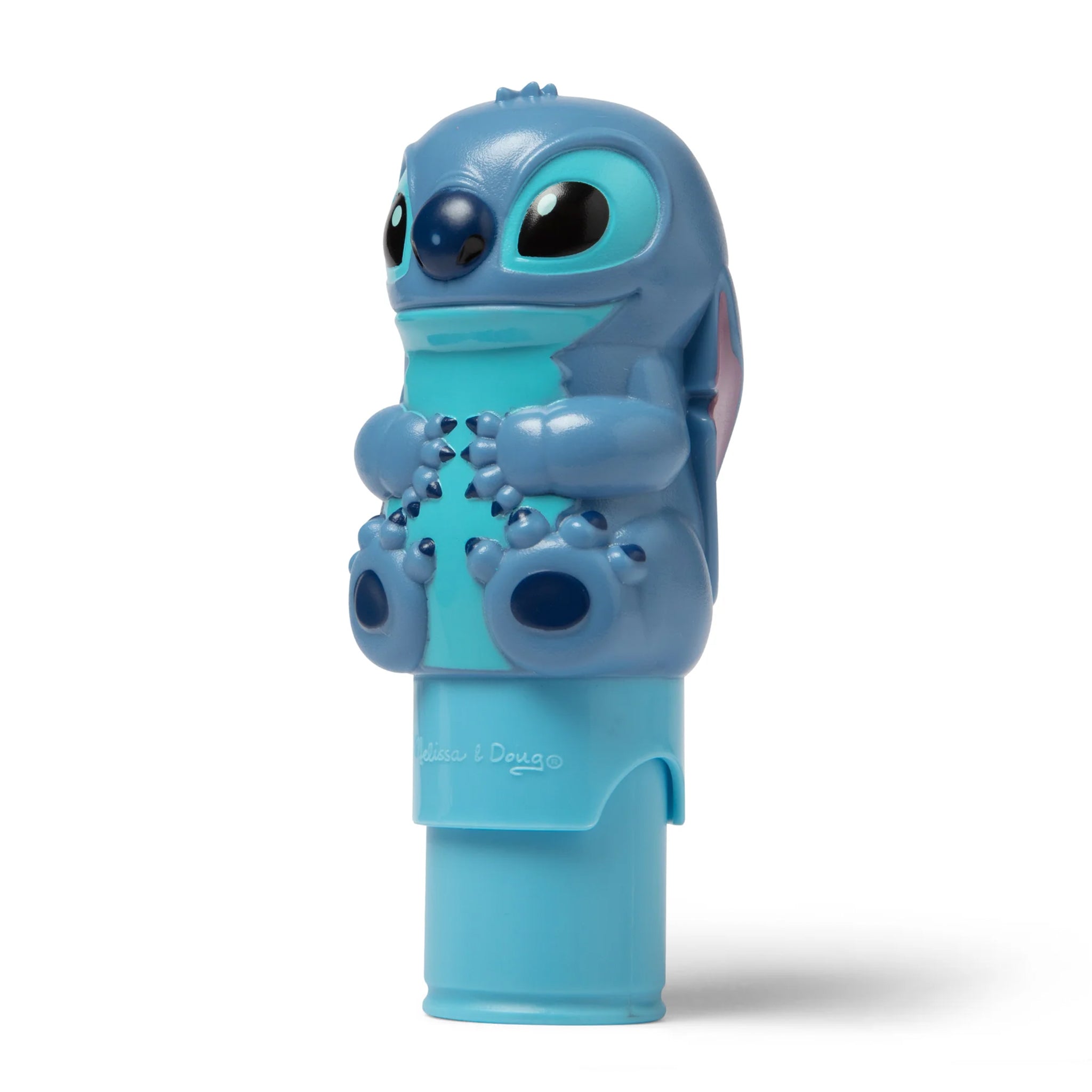 Blue character toy with a textured design on a white background