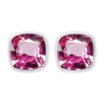 Pair of eye pads with pink gemstones on a white background